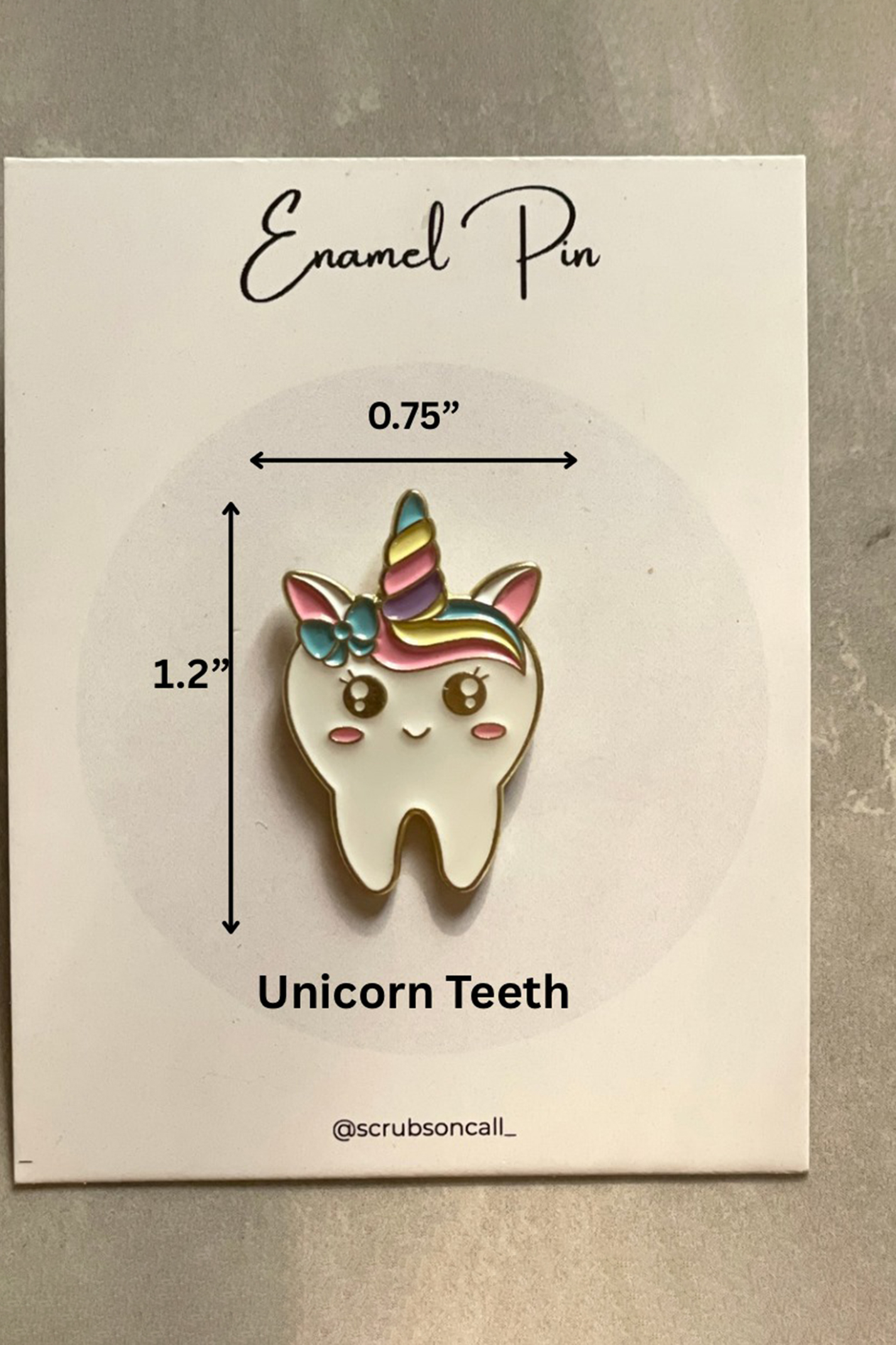 Unicorn teeth enamel pin