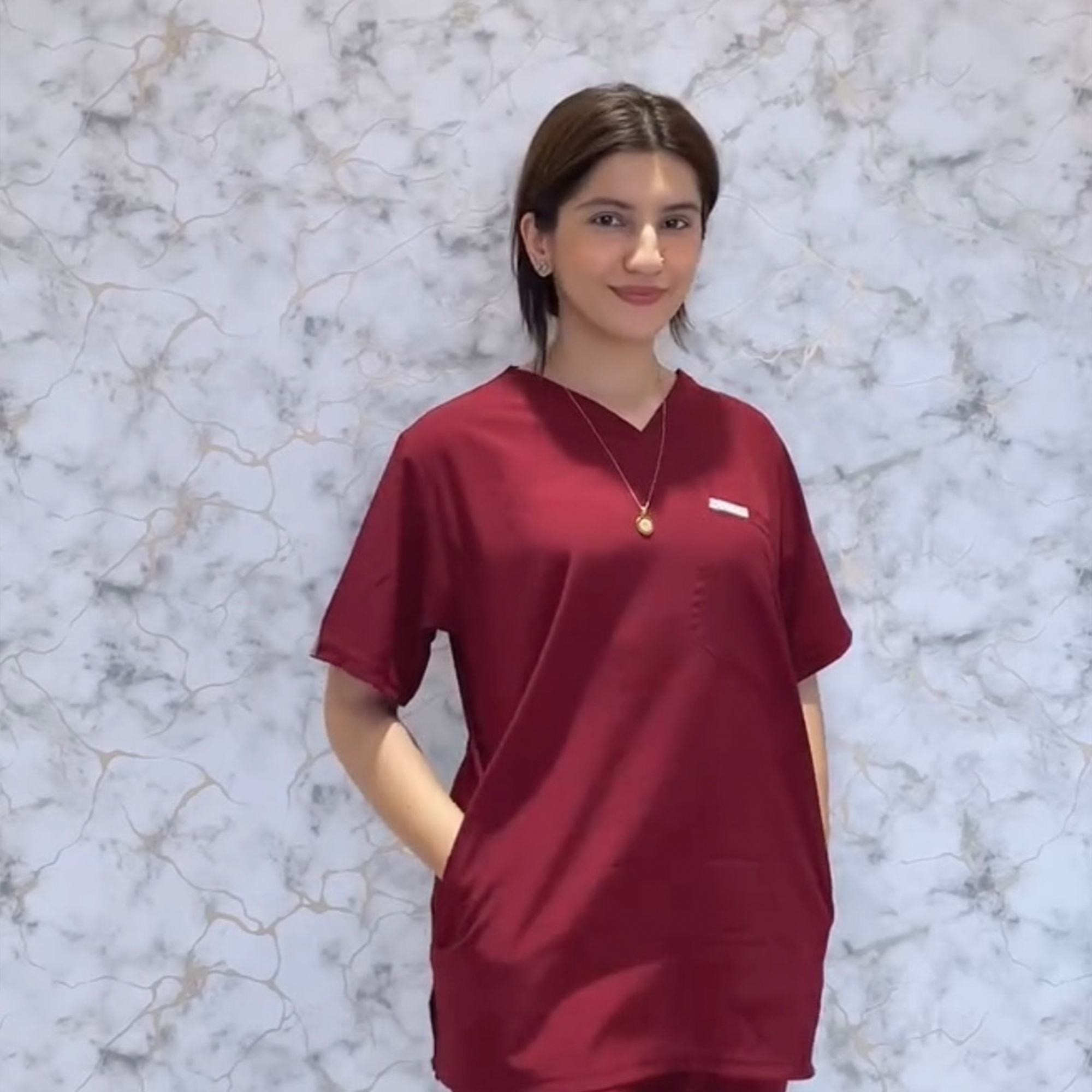 women maroon scrub